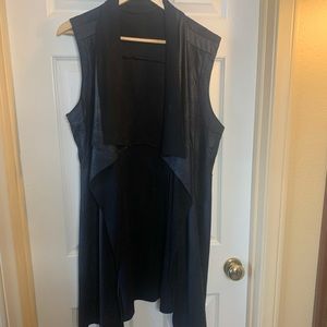 Mid length faux leather vest